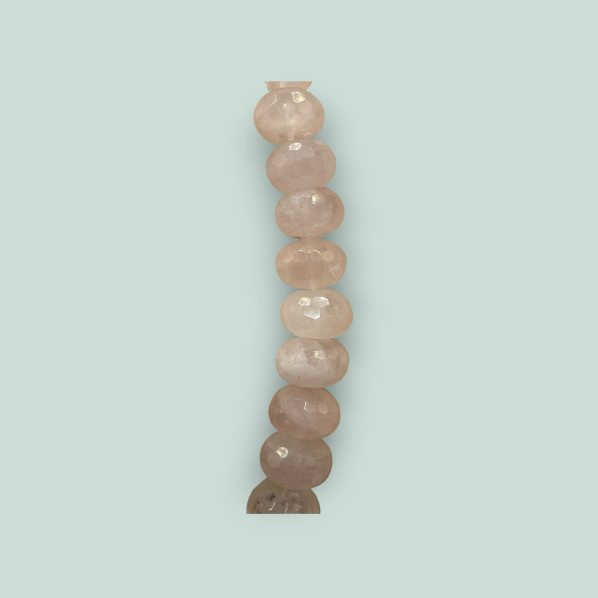 The Salty Bead Co handcrafted necklace featuring faceted light pink rose quartz beads with a soft luminous glow.