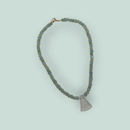 The Salty Bead Co handcrafted necklace with light blue and sage green glass beads and a frosted flared pendant.