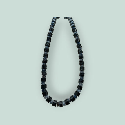 The Salty Bead Co handcrafted necklace with alternating polished black disc beads and mottled grey stone beads.