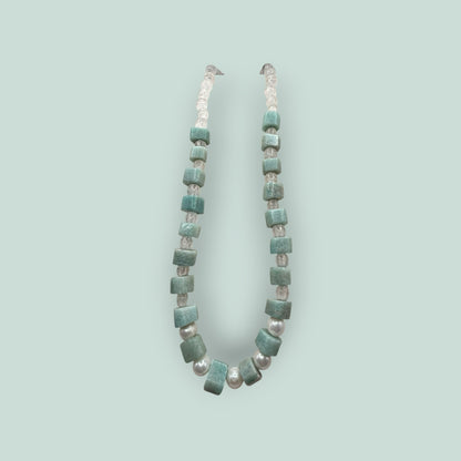 The Salty Bead Co handcrafted statement necklace featuring cube-cut green gemstones and lustrous freshwater pearls.