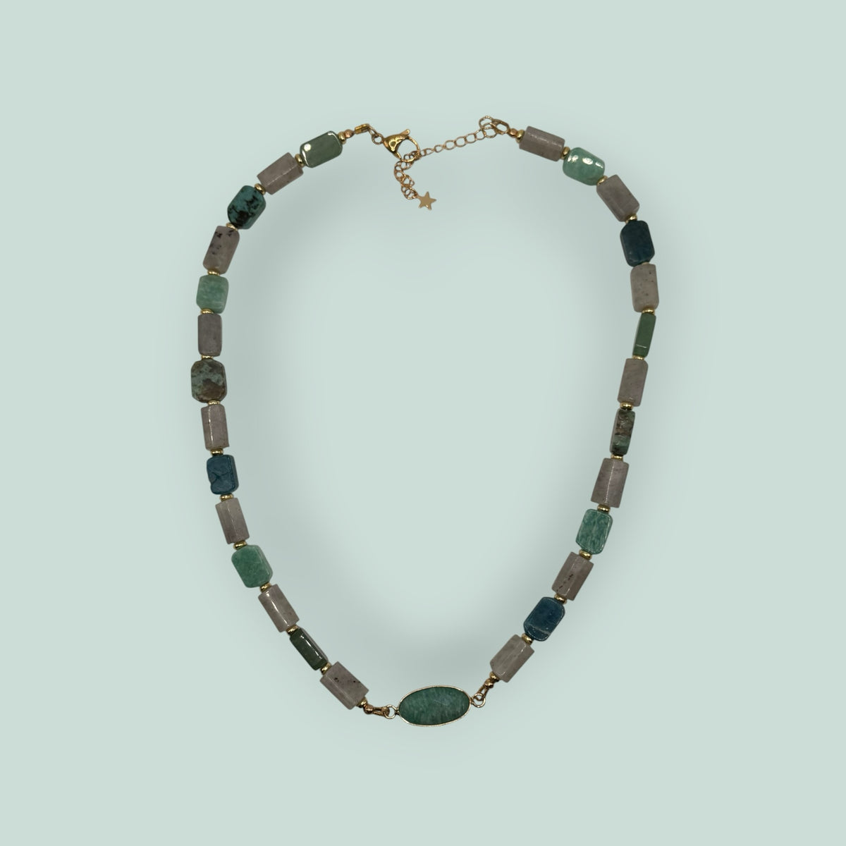 The Salty Bead Co handcrafted gemstone necklace with sage, forest green, and grey rectangular beads and oval pendant.