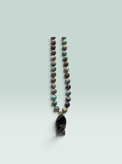 The Salty Bead Co handcrafted necklace with marbled jasper beads and a polished amethyst fish pendant.