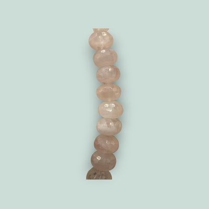 The Salty Bead Co handcrafted necklace featuring faceted light pink rose quartz beads with a soft luminous glow.