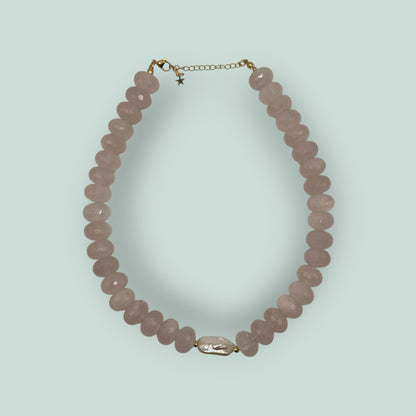 The Salty Bead Co handcrafted necklace with faceted rose quartz beads and a central baroque pearl on gold hardware.